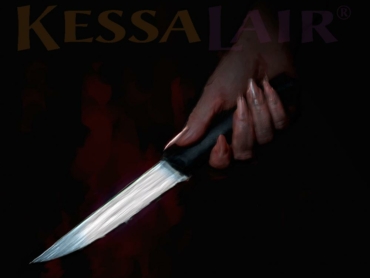 Hand holding knife from the Short Story Silent Comfort at KessaLair